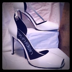 Calvin Klein white patent leather peep toe pumps